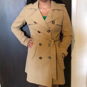 Tan trench coat. Size medium. Brand: New York and Company.